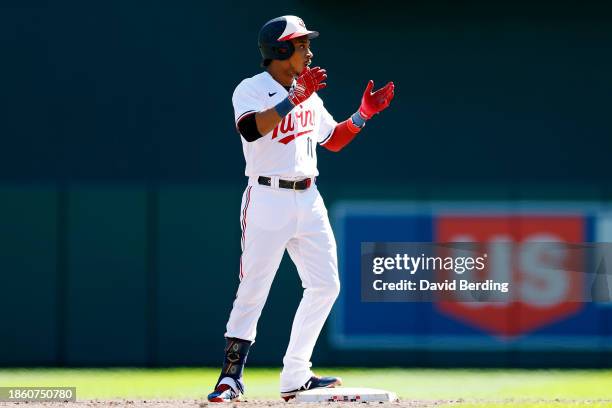 Jorge Polanco of the Minnesota Twins celebrates his double against the Tampa Bay Rays in the third inning at Target Field on September 13, 2023 in...