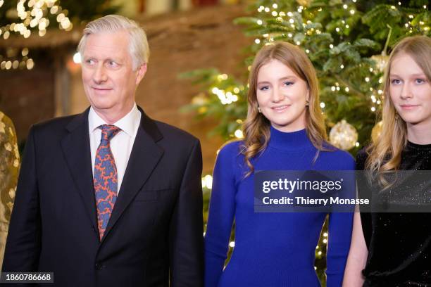 Belgium King Philippe , the Princess Elisabeth, Duchess of Brabant and the Princess Eléonore of Belgium pose in front of the Christmas tree on...