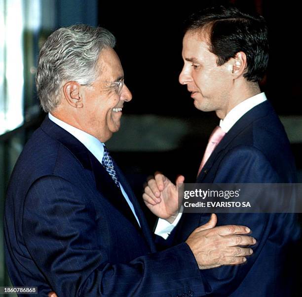 Bolivian President Jorge Quiroga is greeted by his Brazilian counterpart Fernando Henrique Cardoso in Brasilia, Brazil 10 December 2001. El...