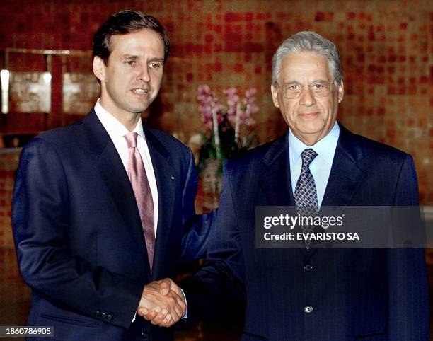 Bolivian President Jorge Quiroga is greeted by his Brazilian counterpart Fernando Henrique Cardoso in Brasilia, Brazil 10 December 2001. El...