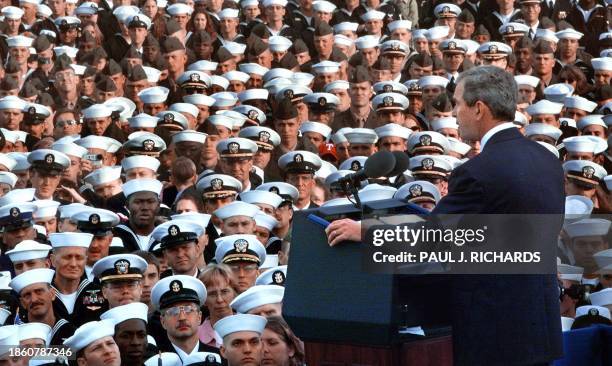 President George W. Bush addresses crewmen -- returned from duty in Operation Enduring Freedom -- on the flight deck of the USS Enterprise 07...