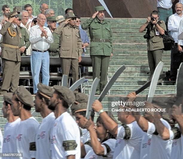 Cuban President Fidel Castro watches the parade of military soldiers in Santiago de Cuba, Cuba 02 December 2001. El presidente cubano Fidel Castro...