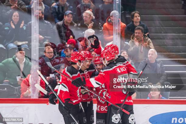 Jason Fuchs of Lausanne HC celebrates his goal with teammates during the Swiss National League game between Lausanne HC and ZSC Lions at Vaudoise...