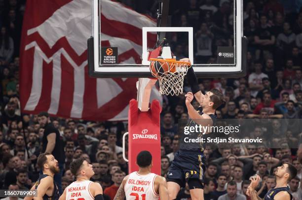 Mario Hezonja, #11 of Real Madrid dunks the ball over Joel Bolomboy, #21 of Crvena Zvezda Meridianbet Belgrade during the Turkish Airlines EuroLeague...