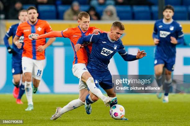 December 2023, Baden-Württemberg, Sinsheim: Soccer: Bundesliga, TSG 1899 Hoffenheim - Darmstadt 98, Matchday 16, PreZero Arena. Darmstadt's Tim...