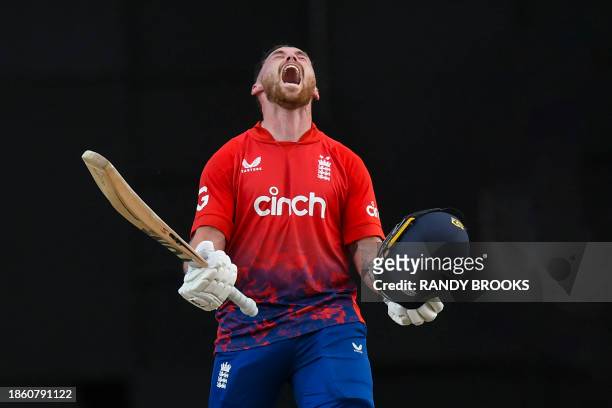 Phil Salt of England celebrates his century during the 4th T20I between the West Indies and England at Brian Lara Cricket Academy Stadium in Tarouba,...