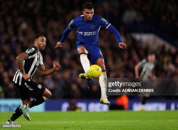 Chelsea's Brazilian defender Thiago Silva controls the ball past Newcastle United's English striker Callum Wilson during the English League Cup...