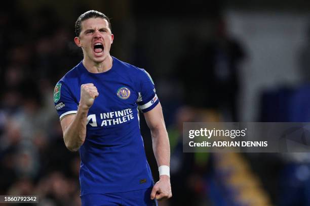Chelsea's English midfielder Conor Gallagher celebrates after scoring a penalty during the penalty shoot out of the English League Cup quarter-final...