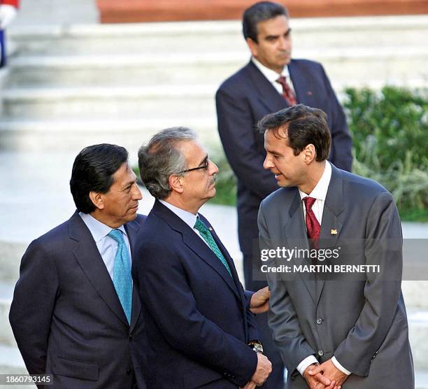 Bolivian President Jorge Quiroga speaks with Colombian President Andres Pastrana and Peruvian President Alejandro Toledo during the II Meeting of...