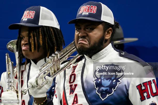 Trumpet players of the Howard marching band display their "stank face" in preparation of their half time performance during the Cricket Celebration...