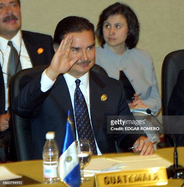 The president of Guatemala, Alfonso Portillo asks a question during the Reunion Cumbre de Presidentes de Centroamerica, Cancilleres y Ministros de...