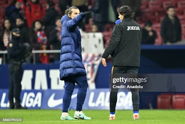 Caglar Soyuncu of Getafe and Enes Unal of Getafe greet each other after La Liga week 18 football match between Atletico Madrid and Getafe at Civitas...