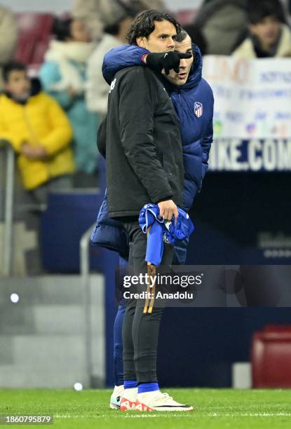 Caglar Soyuncu of Getafe and Enes Unal of Getafe greet each other after La Liga week 18 football match between Atletico Madrid and Getafe at Civitas...