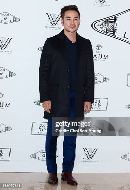 Uhm Tae-Woong attends the Mag & Logan collection during Seoul Fashion Week 2014 S/S at the Raum on October 23, 2013 in Seoul, South Korea.