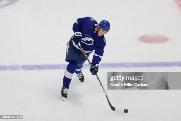 Haydn Fleury of the Tampa Bay Lightning shoots the puck for a goal against the St Louis Blues during the second period at Amalie Arena on December...