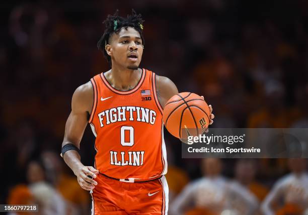 Illinois Fighting Illini guard Terrence Shannon Jr. Brings the ball up court during the college basketball game between the Tennessee Volunteers and...
