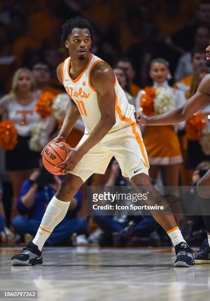 Tennessee Volunteers forward Tobe Awaka controls the ball during the college basketball game between the Tennessee Volunteers and the Illinois...
