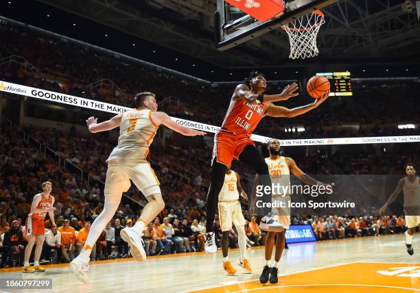 Illinois Fighting Illini guard Terrence Shannon Jr. Drives to the basket during the college basketball game between the Tennessee Volunteers and the...