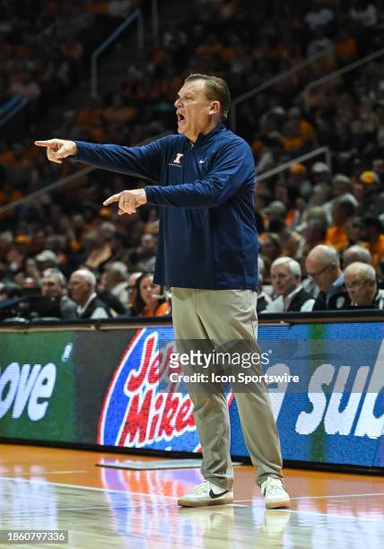 Illinois Fighting Illini head coach Brad Underwood coaches during the college basketball game between the Tennessee Volunteers and the Illinois...