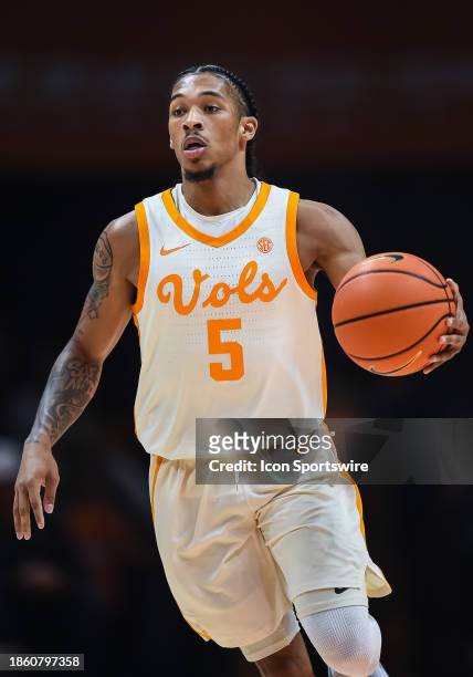 Tennessee Volunteers guard Zakai Zeigler pushes the ball up the court during the college basketball game between the Tennessee Volunteers and the...