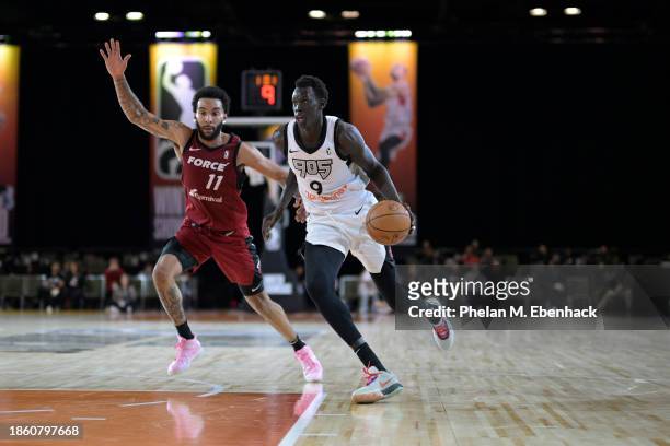 Makur Maker of the Raptors 905 dribbles the ball during the game against the Sioux Falls Skyforce during the 2023 G League Winter Showcase on...
