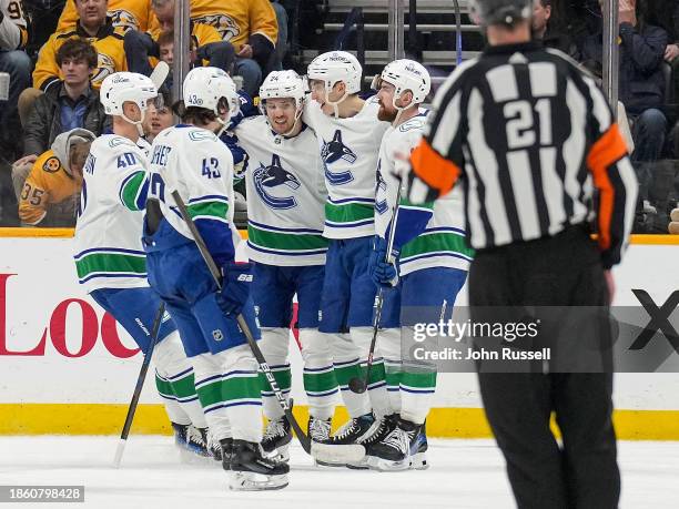 Pius Suter of the Vancouver Canucks celebrates his goal against against the Nashville Predators during an NHL game at Bridgestone Arena on December...