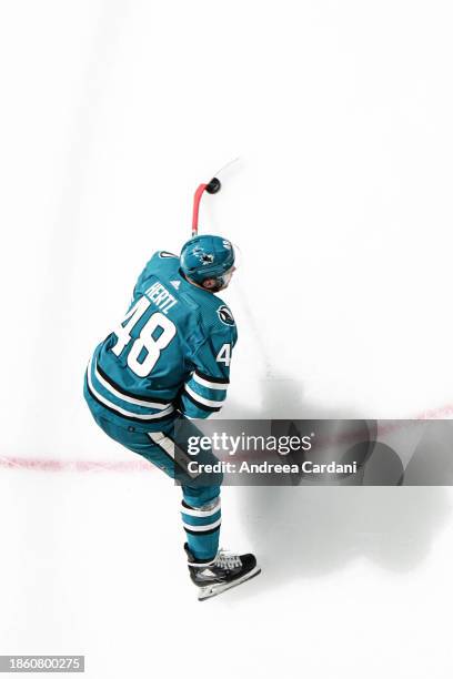 An overhead view of Tomas Hertl of the San Jose Sharks skating with the puck at SAP Center on December 19, 2023 in San Jose, California.