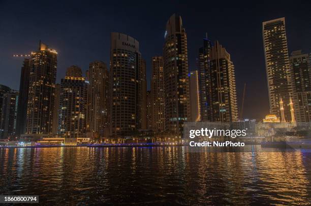 Skyscrapers are towering over the Dubai Marina in Dubai, United Arab Emirates, on December 19, 2023.