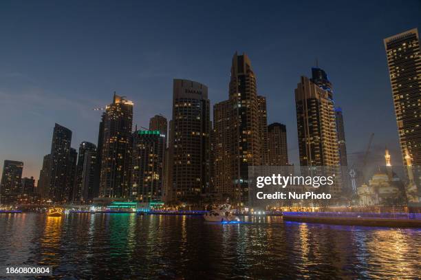 Skyscrapers are towering over the Dubai Marina in Dubai, United Arab Emirates, on December 19, 2023.