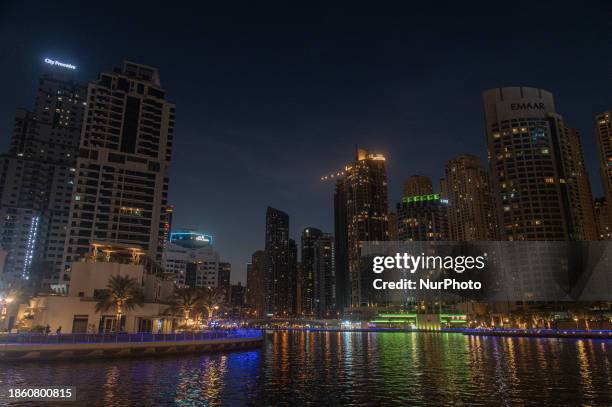 Skyscrapers are towering over the Dubai Marina in Dubai, United Arab Emirates, on December 19, 2023.