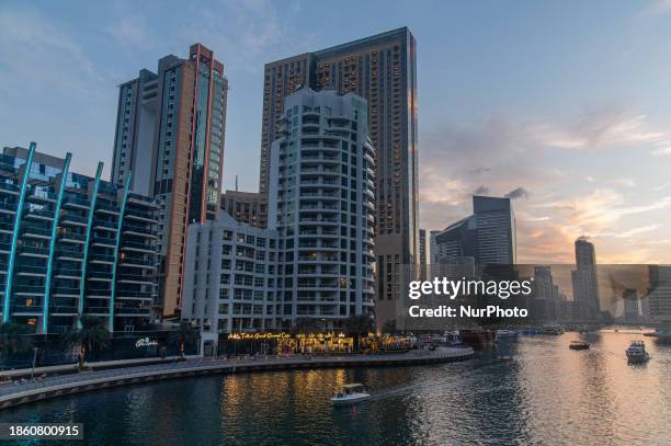 Skyscrapers are towering over the Dubai Marina in Dubai, United Arab Emirates, on December 19, 2023.