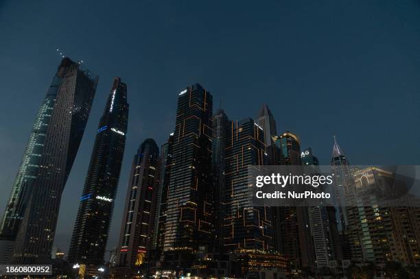 Skyscrapers are towering over the Dubai Marina in Dubai, United Arab Emirates, on December 19, 2023.