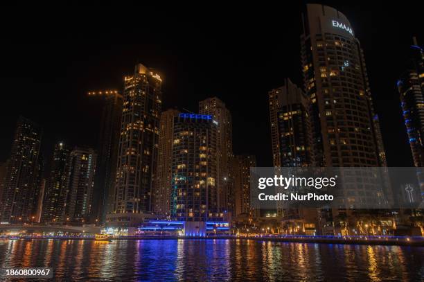 Skyscrapers are towering over the Dubai Marina in Dubai, United Arab Emirates, on December 19, 2023.