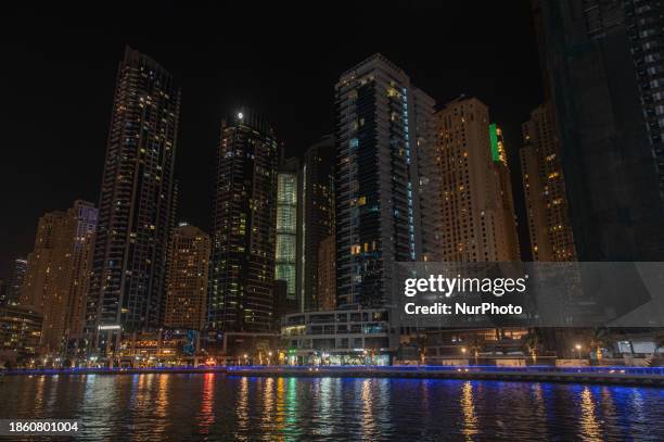 Skyscrapers are towering over the Dubai Marina in Dubai, United Arab Emirates, on December 19, 2023.