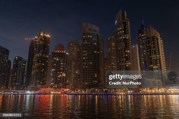 Skyscrapers are towering over the Dubai Marina in Dubai, United Arab Emirates, on December 19, 2023.