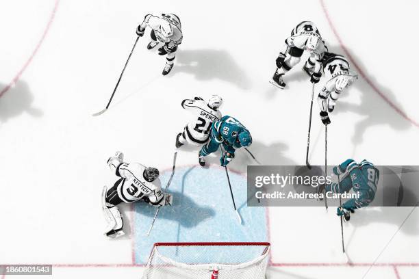 An overhead view of David Rittich of the Los Angeles Kings stopping the puck at SAP Center on December 19, 2023 in San Jose, California.