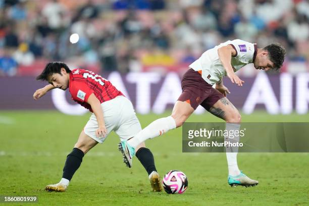 John Stones centre-back of Manchester City and England and Shusaku Nishikawa Goalkeeper of Urawa Red and Japan 0 compete for the ball during the FIFA...