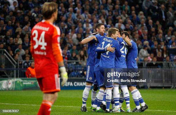 Fernando Torres of Chelsea and team mates celebrate after Torres scores his team's first goal during the UEFA Champions League Group E match between...