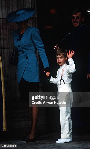 Diana, Princess of Wales with Prince William, who is acting as a pageboy at a society wedding in Hereford Cathedral, on October 08, 1988 in Hereford,...
