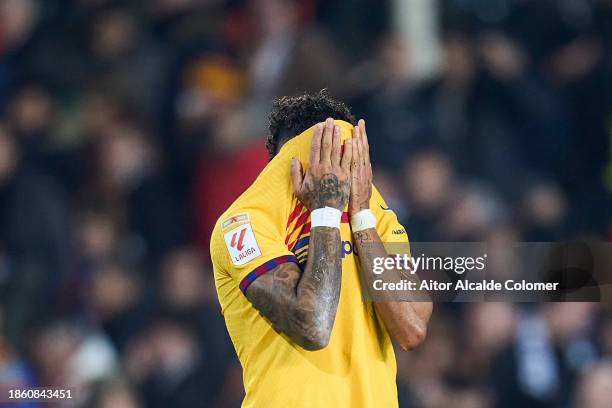 Raphinha of FC Barcelona reacts during the LaLiga EA Sports match between Valencia CF and FC Barcelona at Estadio Mestalla on December 16, 2023 in...