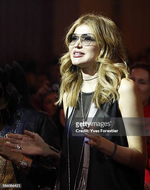 Gulnara Karimova chairwoman of the Board of Trustees Fund Forum applauds Russian Singer Valeria after her performance at Istiqlol Palace on October...