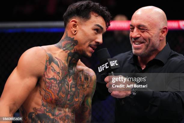 Andre Fili is interviewed by Joe Rogan after his featherweight fight during the UFC 296 event at T-Mobile Arena on December 16, 2023 in Las Vegas,...