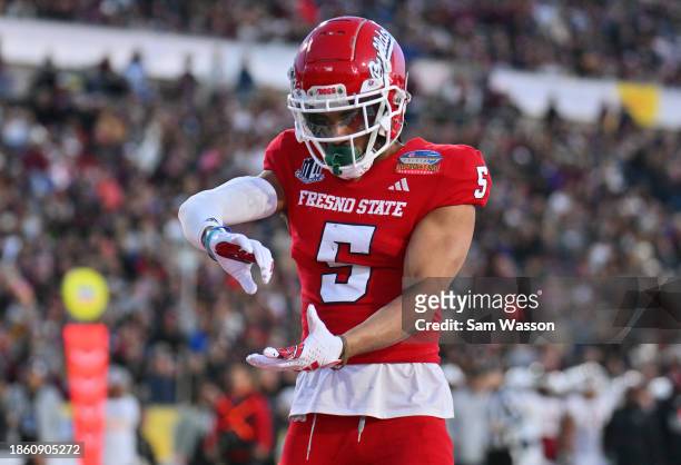 Wide receiver Jaelen Gill of the Fresno State Bulldogs celebrates after scoring a touchdown against the New Mexico State Aggies during the first half...