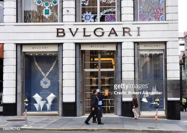 Shoppers pass in front of the Bulgari store in San Francisco's upscale Union Square shopping district. The store is noted for its Italian jewelry and...