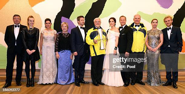 Prince Frederik of Denmark and Princess Mary of Denmark pose with winners of the Crown Prince Couple Awards 2013 held at the Sydney Opera House on...