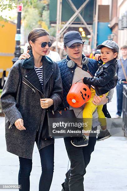 Miranda Kerr, Orlando Bloom and baby Flynn seen together on Upper East Side on October 28, 2013 in New York City.