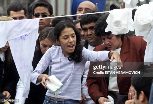 Photo of Zarai Orozco taken on 26 July 2002 in Lima, during a mobilization demanding Alejandro Toledo, president of Peru, to admit he is her father....