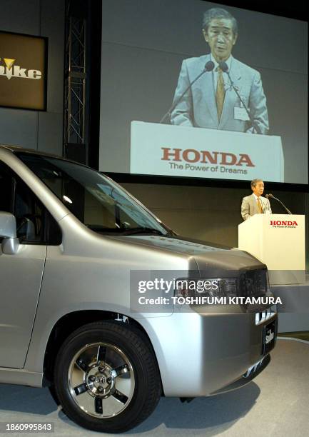 Honda President Hiroyuki Yoshino introduces the company's new compact multi-purpose wagon, "Mobilio Spike" during its press preview in a Tokyo hotel...