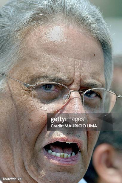 Brazilian President Fernando Henrique Cardoso, gives a speech 11 October 2002, during the inauguration of a highway in Sao Paulo, Brazil. AFP...
