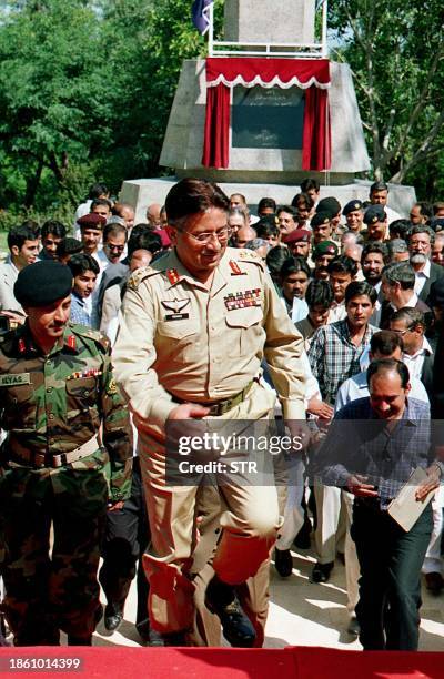 Pakistani President General Pervez Musharraf makes his way for the ground-breaking ceremony of Mangla Dam Raising Project after unveiling a plaque at...